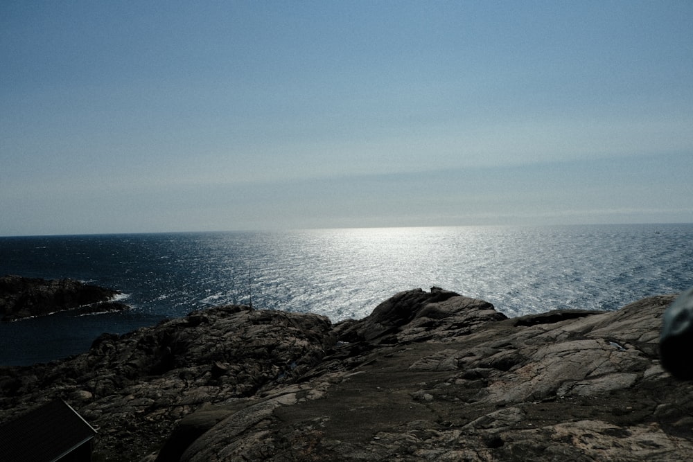 a view of the ocean from a rocky outcropping