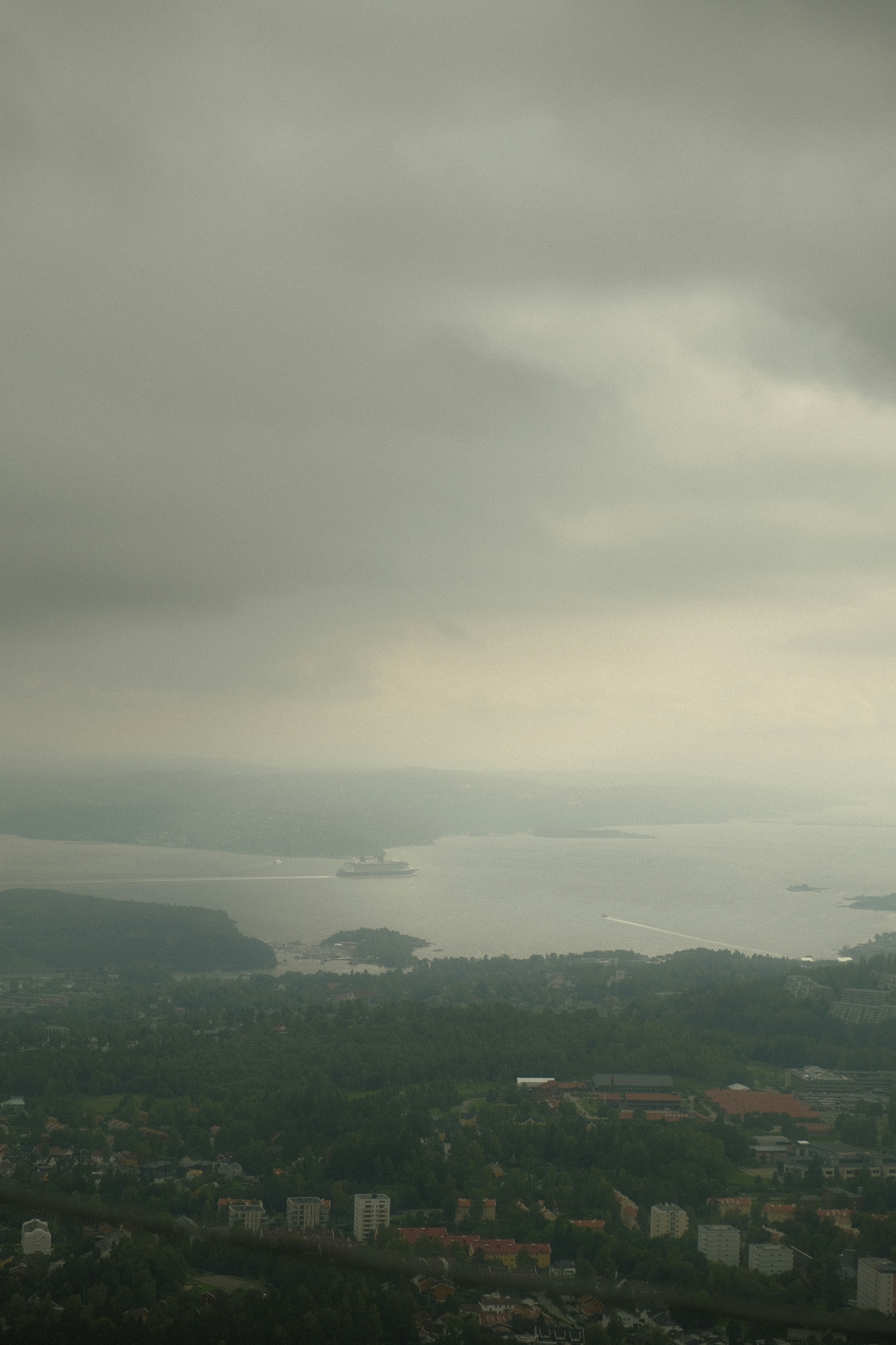 a view of a large body of water under a cloudy sky