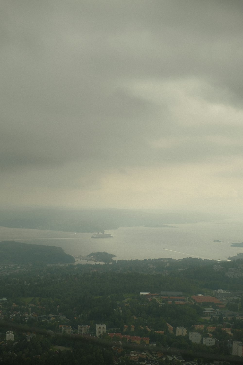 a view of a large body of water under a cloudy sky
