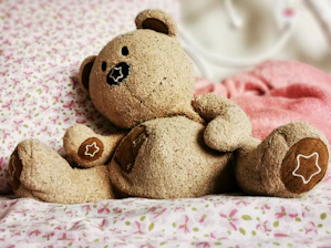 A cozy pile of soft clothing ready to be transformed into a memory bear.