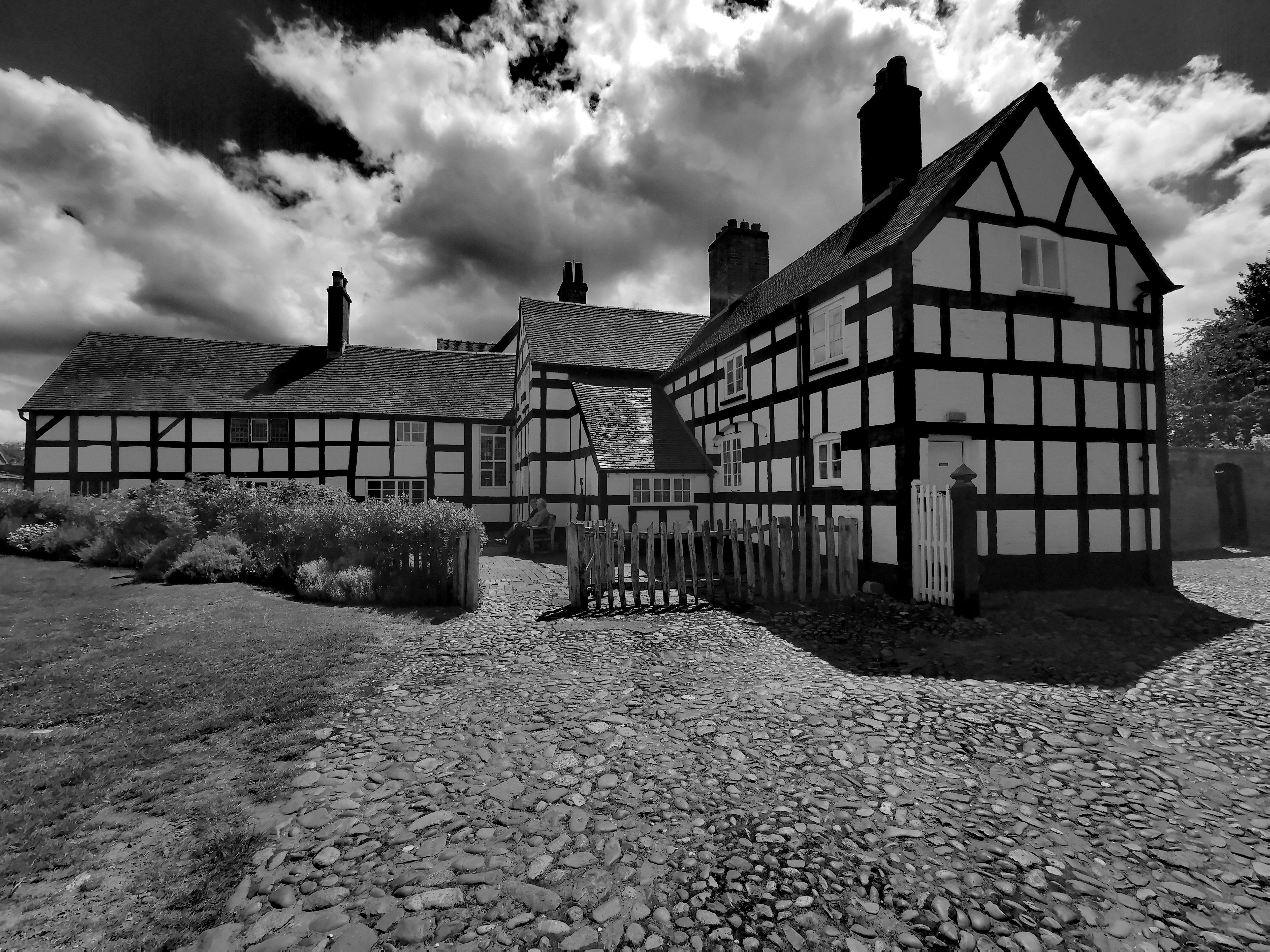 a black and white photo of a house