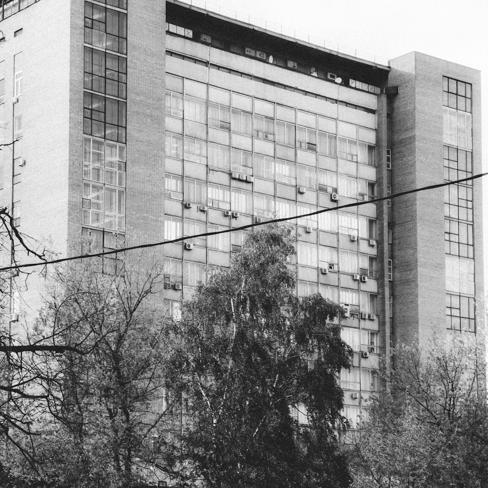 a black and white photo of a tall building