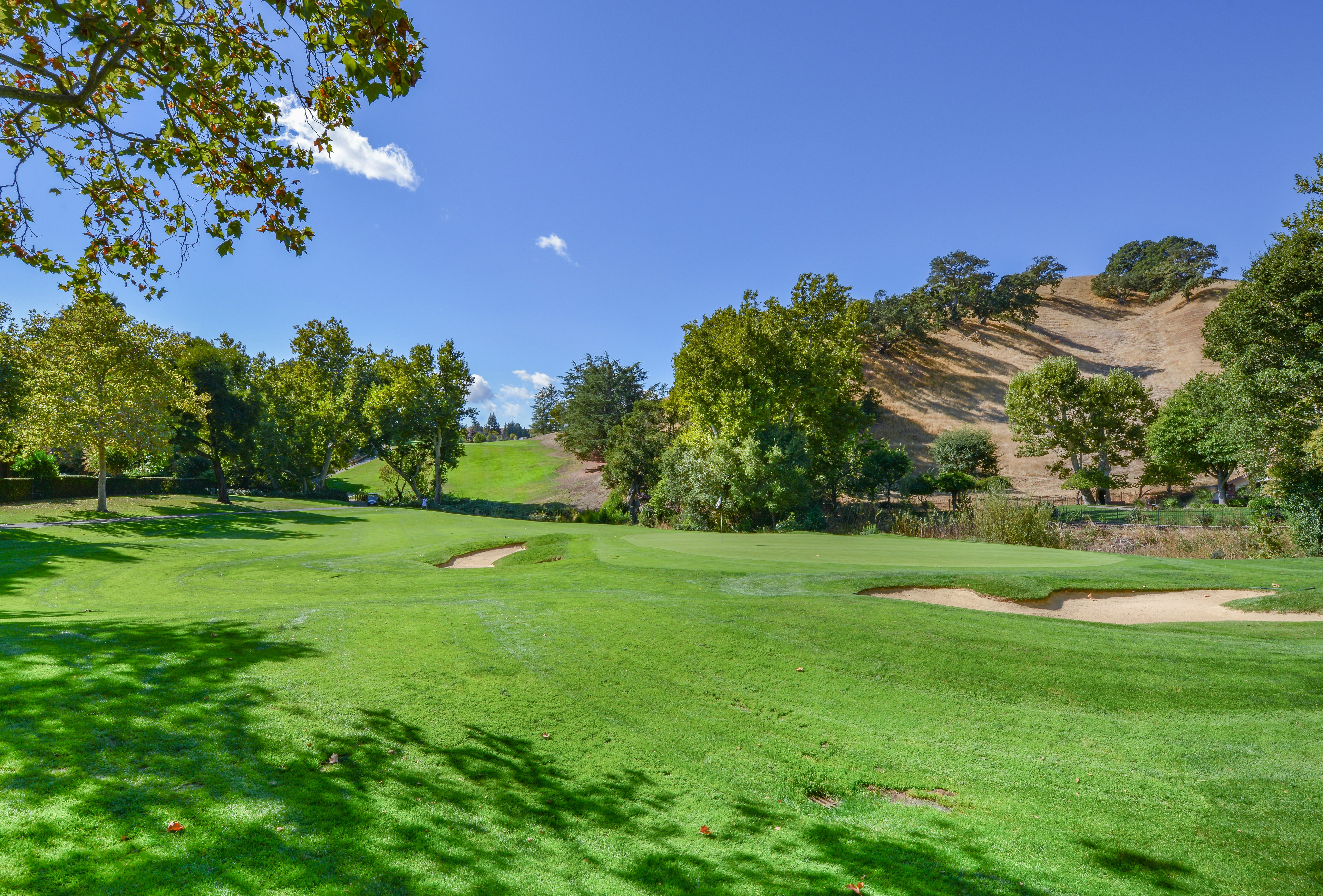 a view of a golf course from a distance