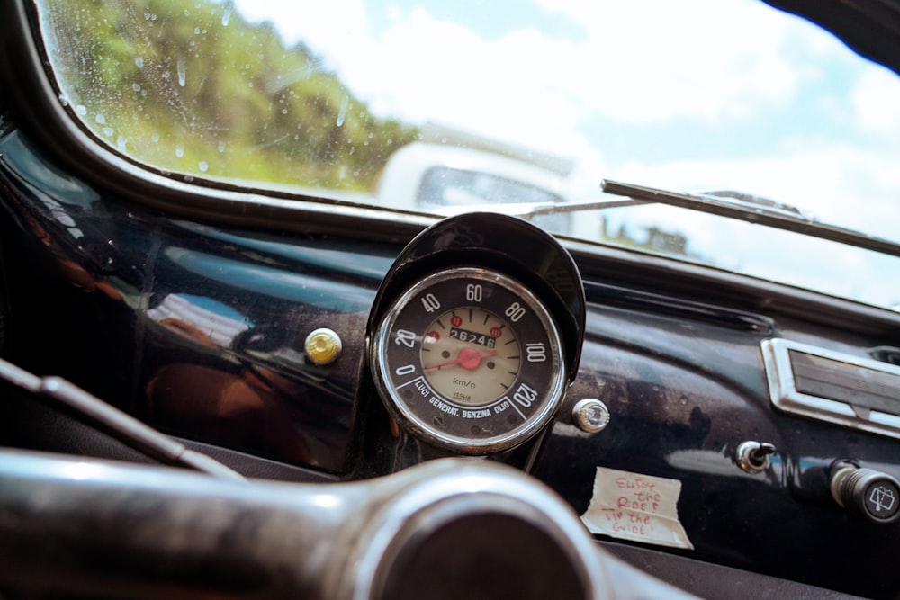 a close up of a speedometer in a car