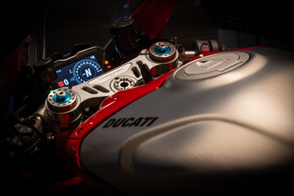 a close up of a motorcycle with a speedometer