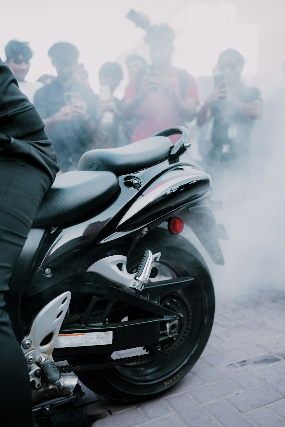 a motorcycle with a lot of smoke coming out of it