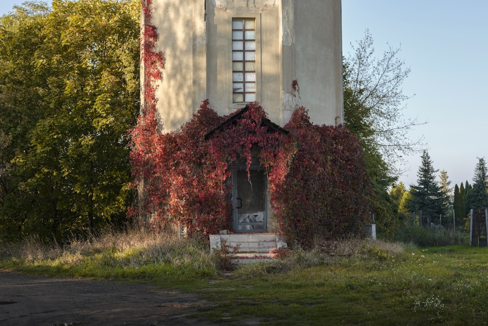 a tall tower with a clock on the side of it