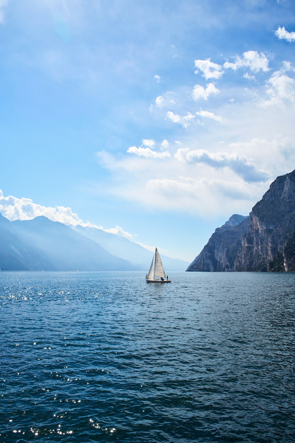 a sailboat in the middle of a large body of water