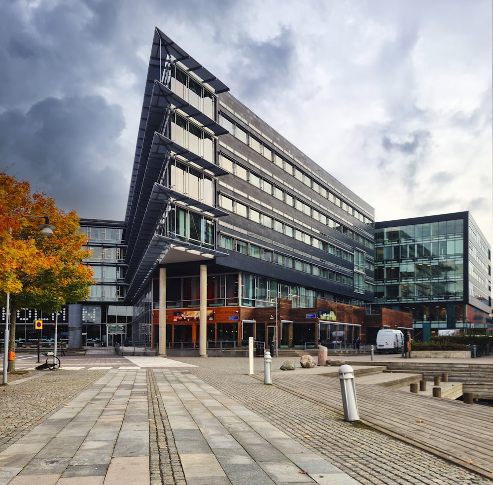 a very large building with a very long walkway in front of it