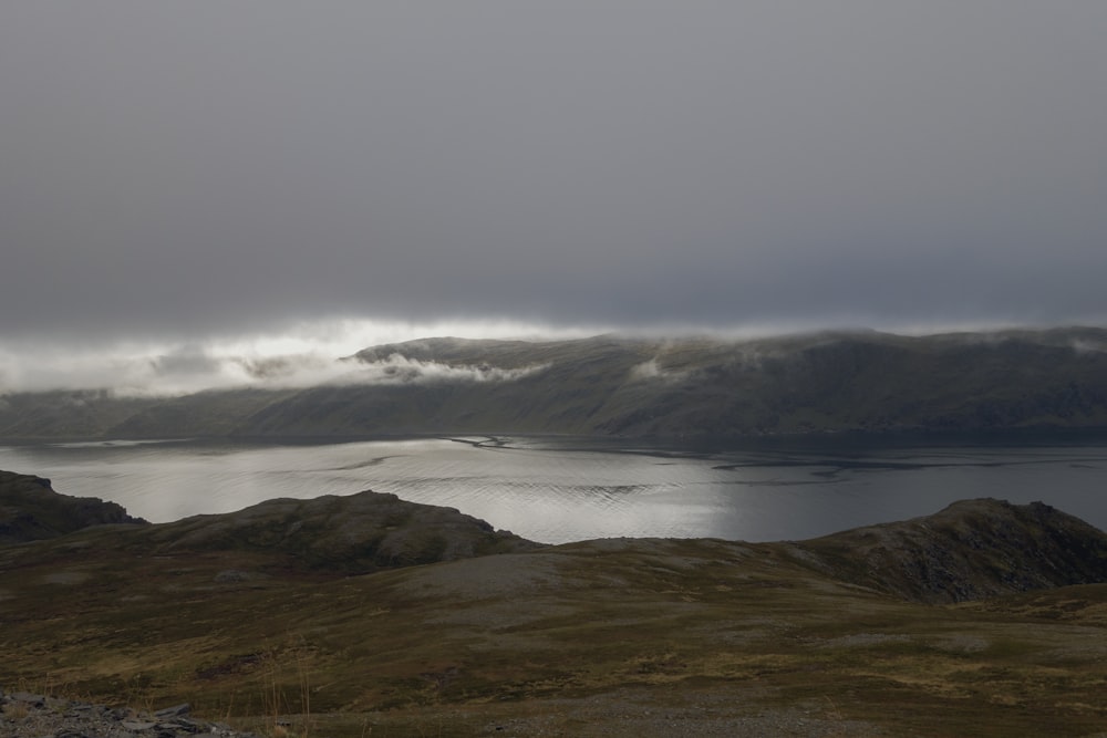 a large body of water surrounded by mountains