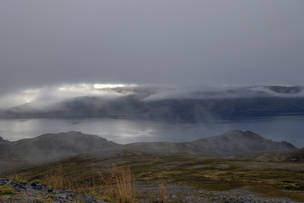 a large body of water surrounded by mountains