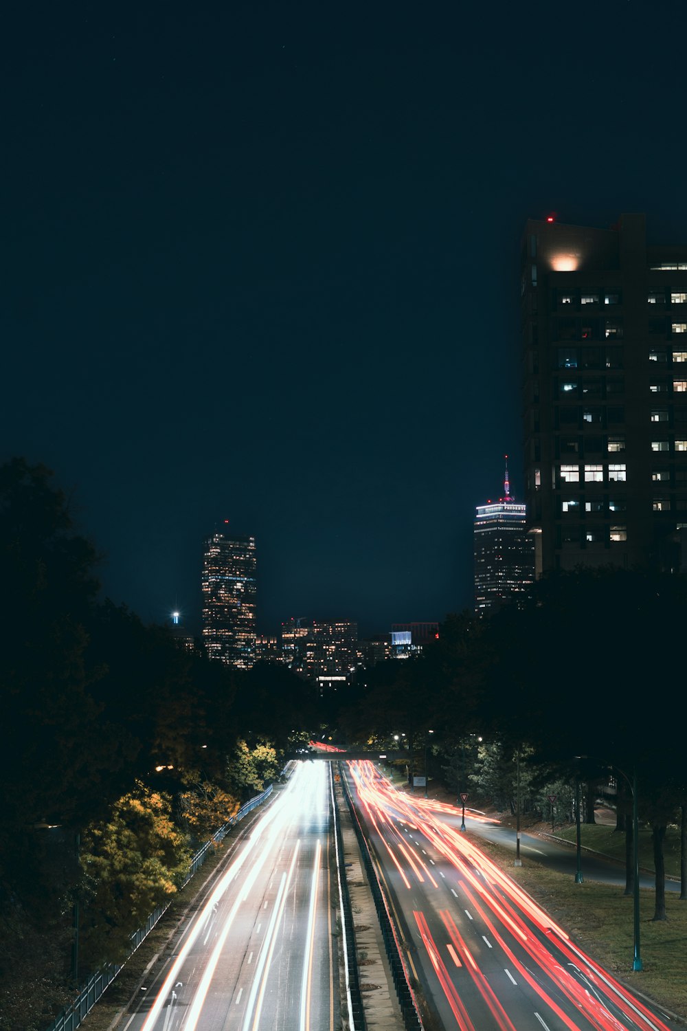 a city street at night with long exposure