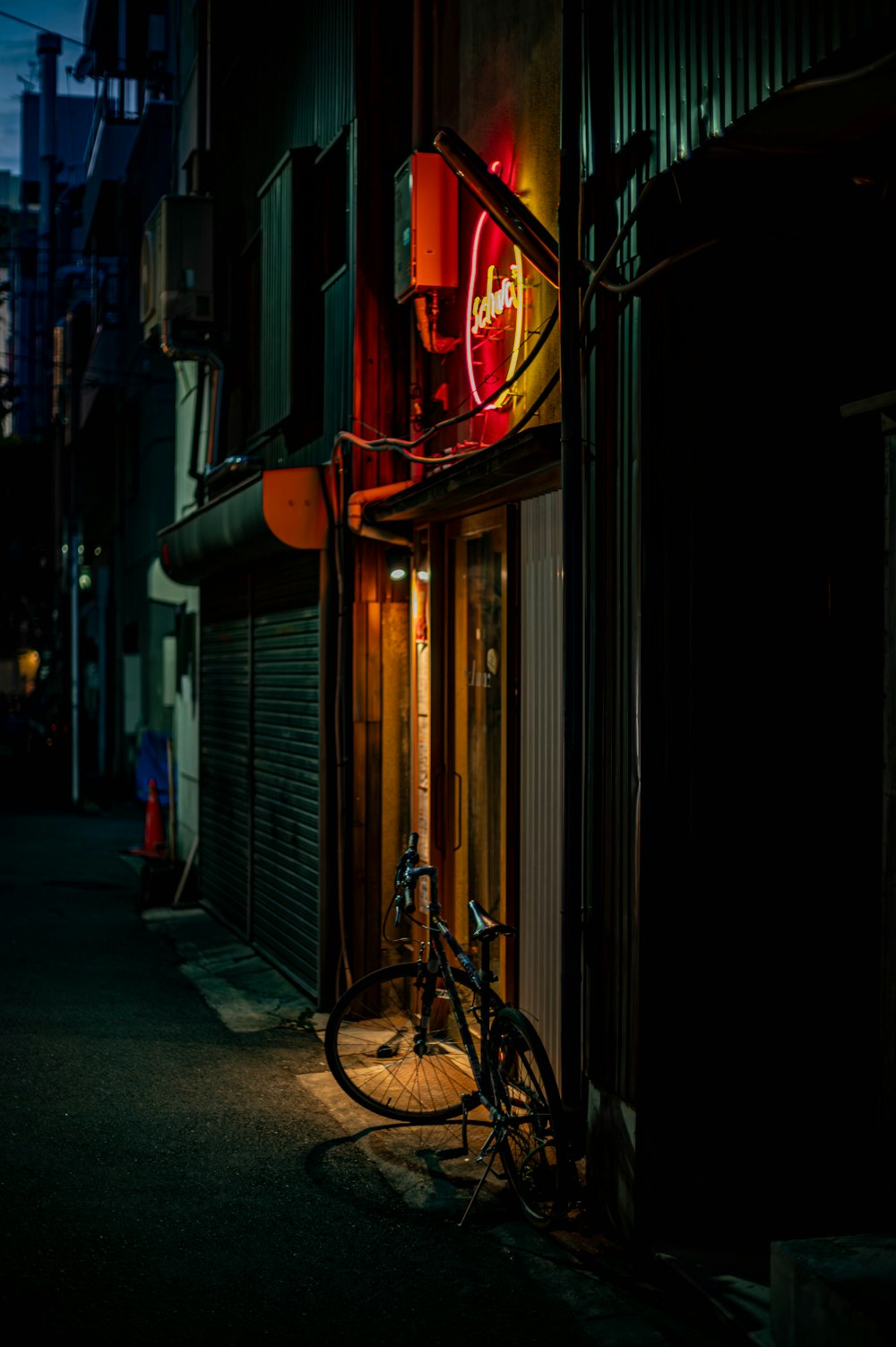 a bicycle is parked outside of a building