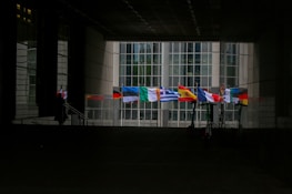 Gigatron’s multinational offices with flags of Canada, UK, India, and Saudi Arabia.