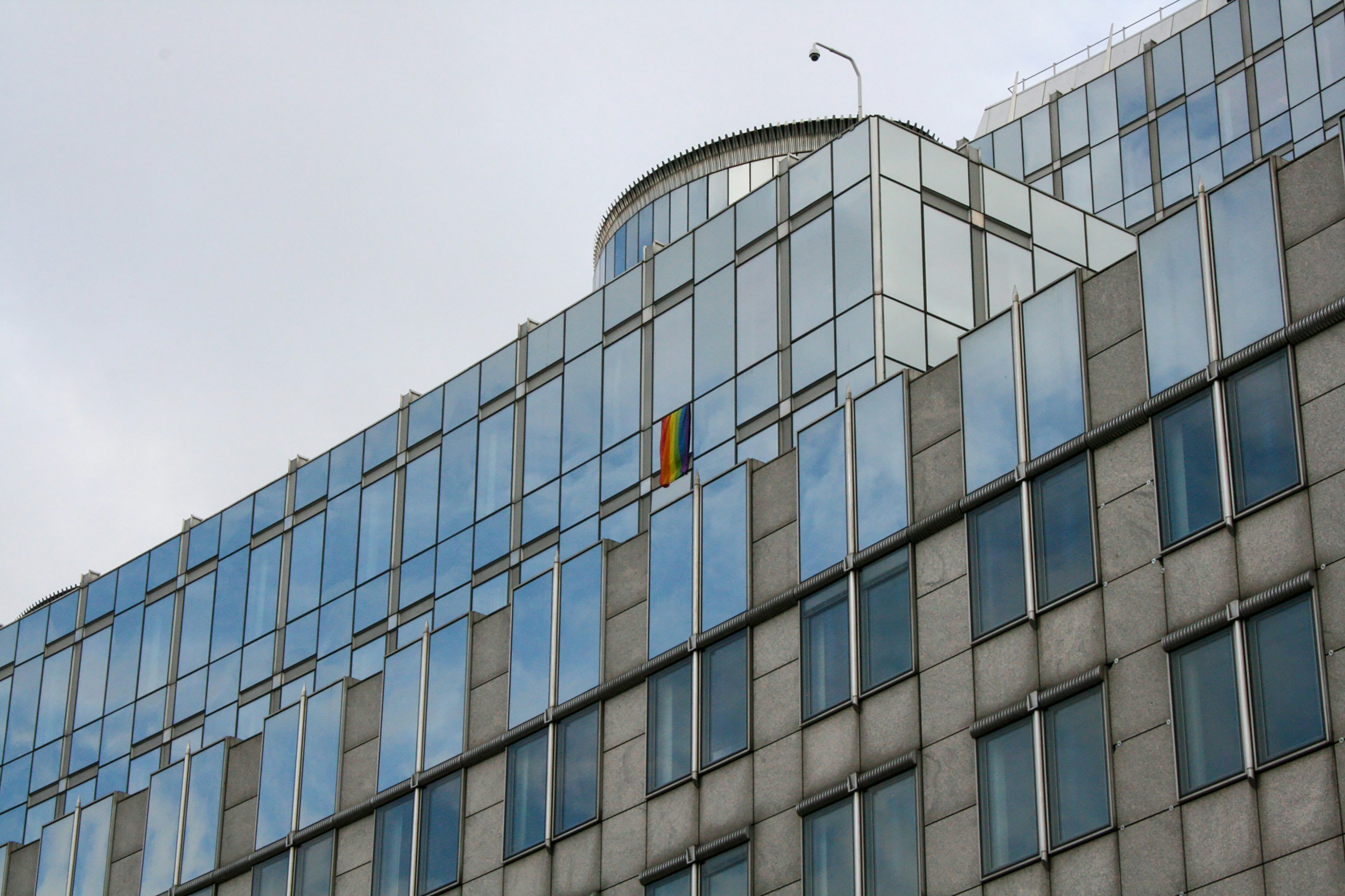 a tall building with lots of windows on top of it