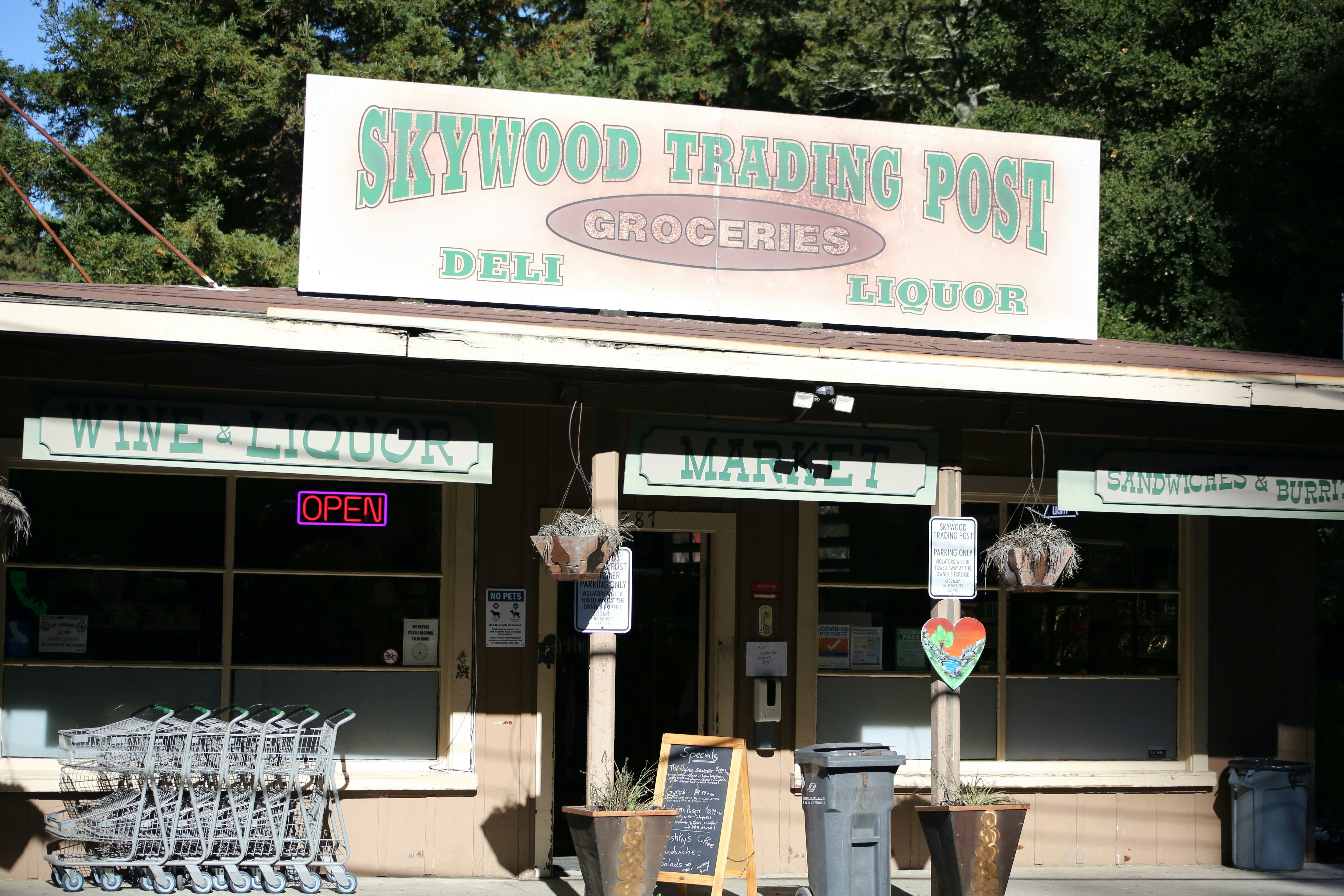 a building with a sign that says skywood trading post