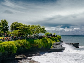 A diverse group of travelers enjoying a scenic coastal tour together.
