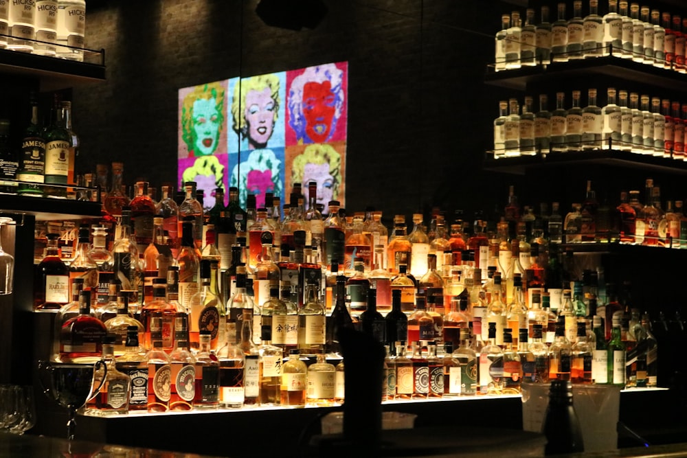 a bar filled with lots of bottles of liquor