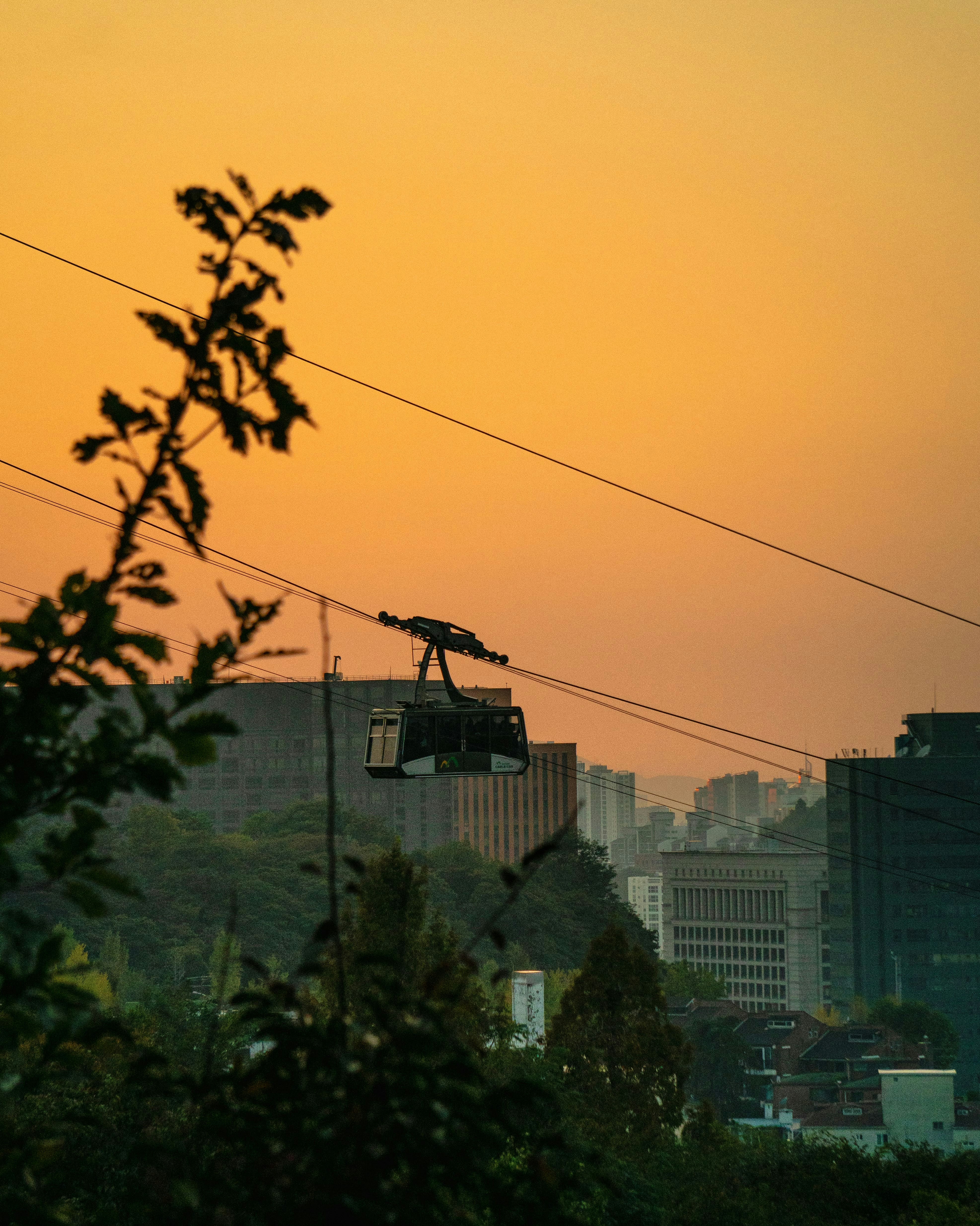a view of a city from a hill top