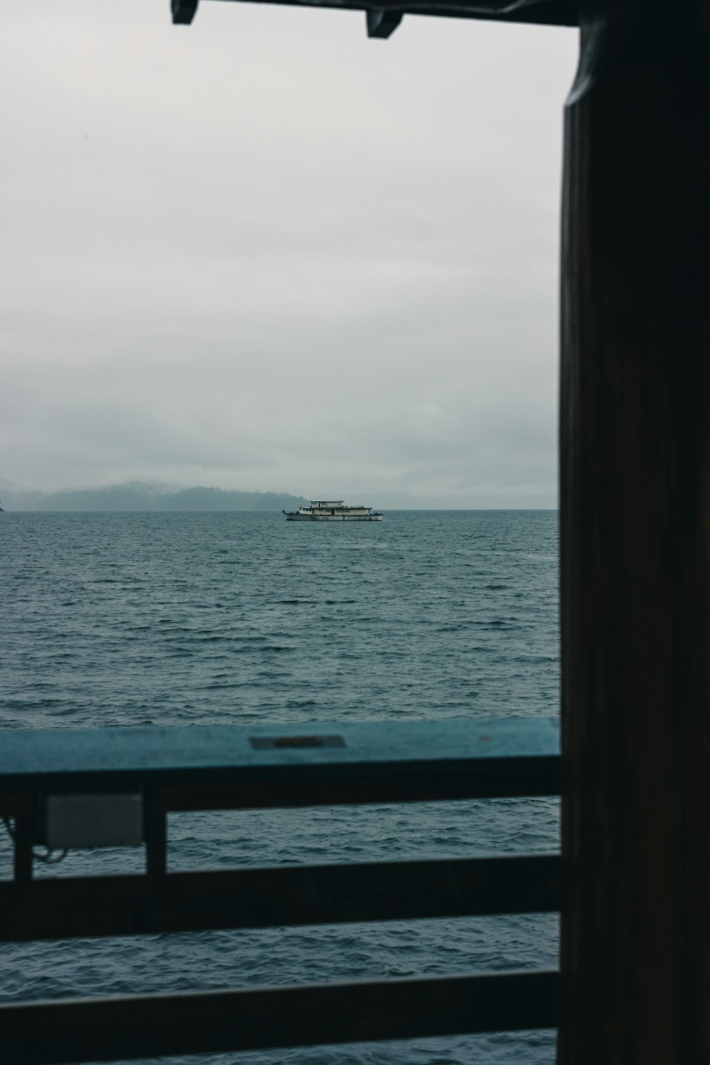 a boat is out on the water in the distance