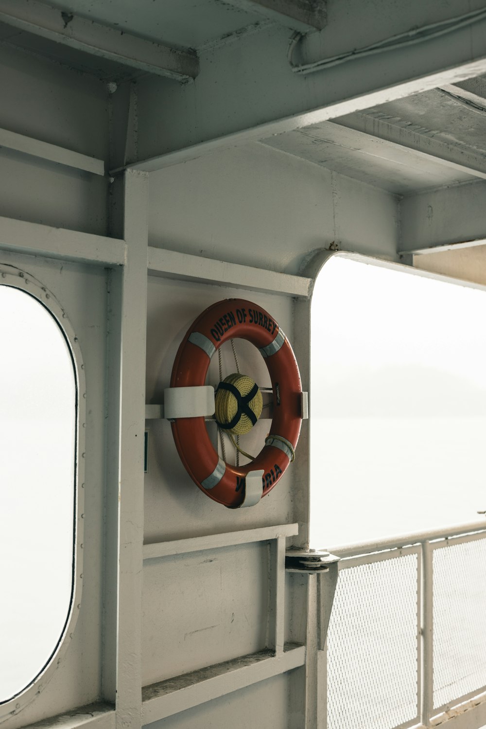 a life preserver hanging on the side of a boat