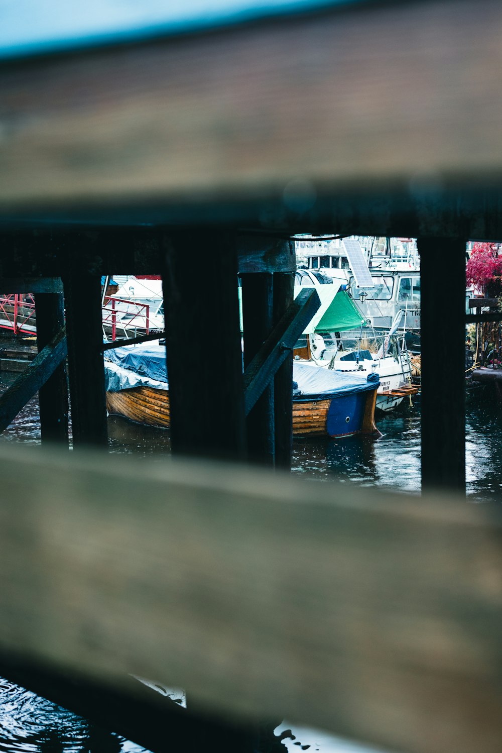 a view of a dock with boats in the water