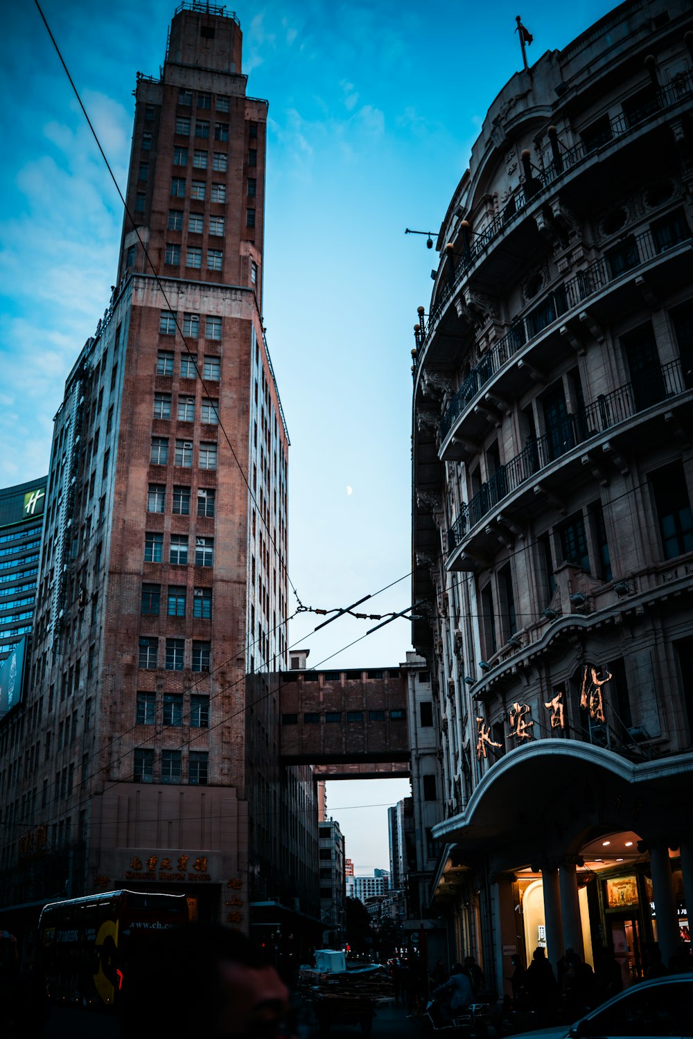 a very tall building with a clock on it's side