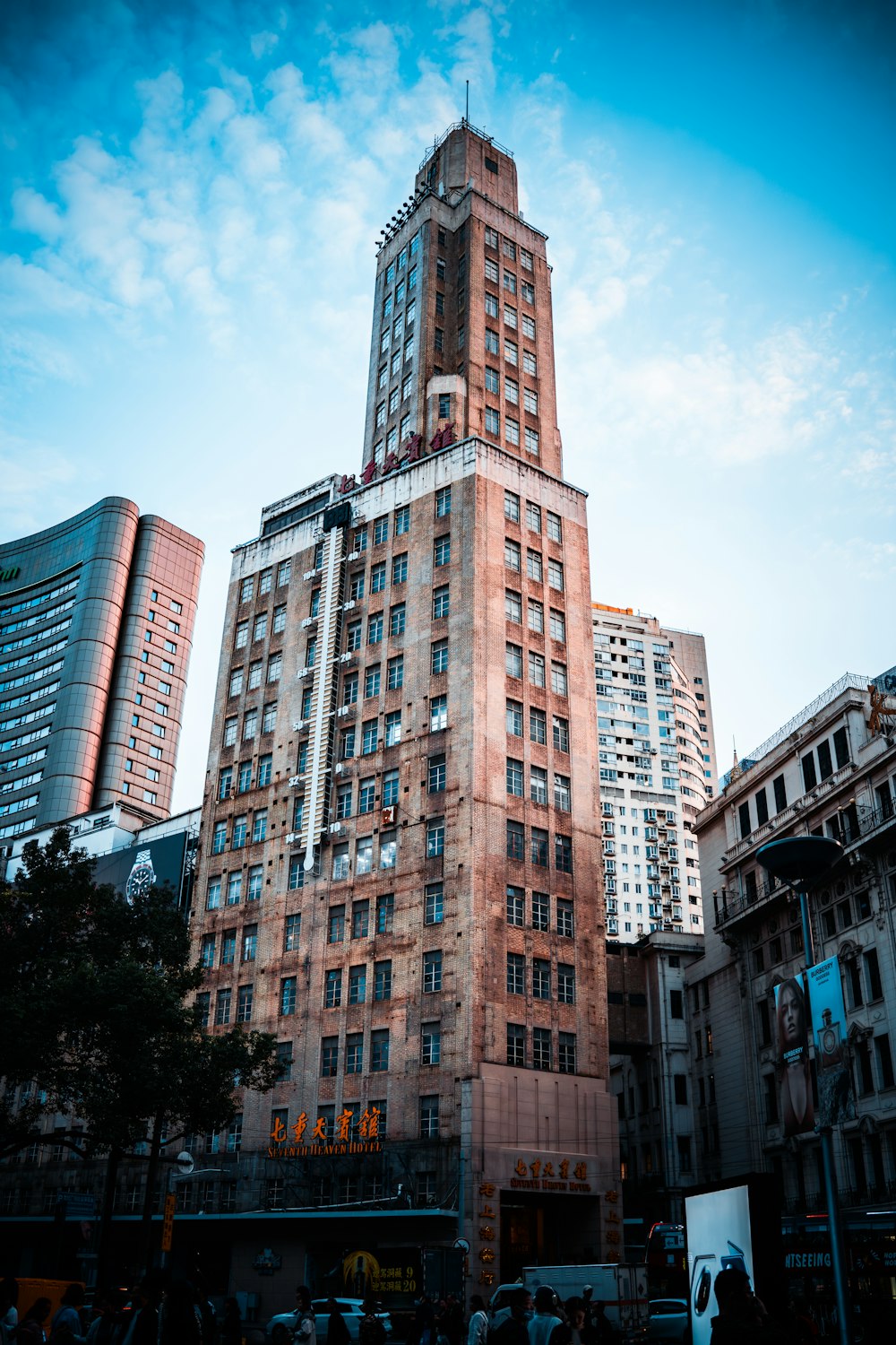 a tall building with a clock on the top of it