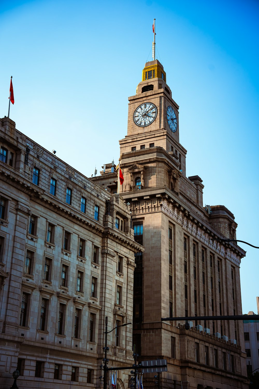 a large building with a clock on the top of it