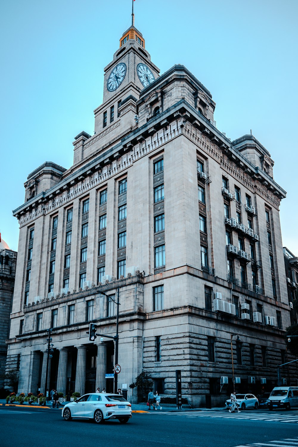 a large building with a clock on the top of it