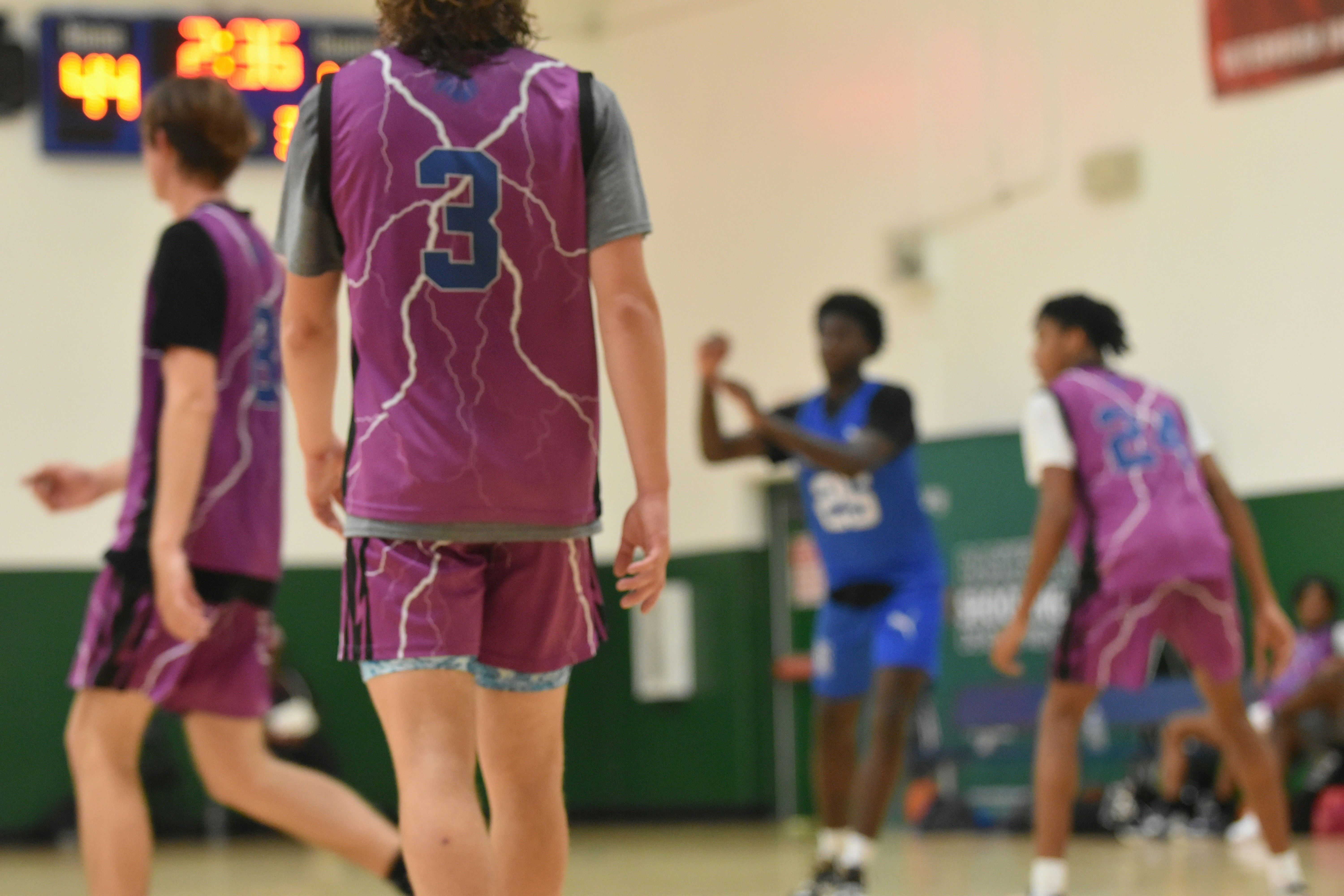Basketball players on court