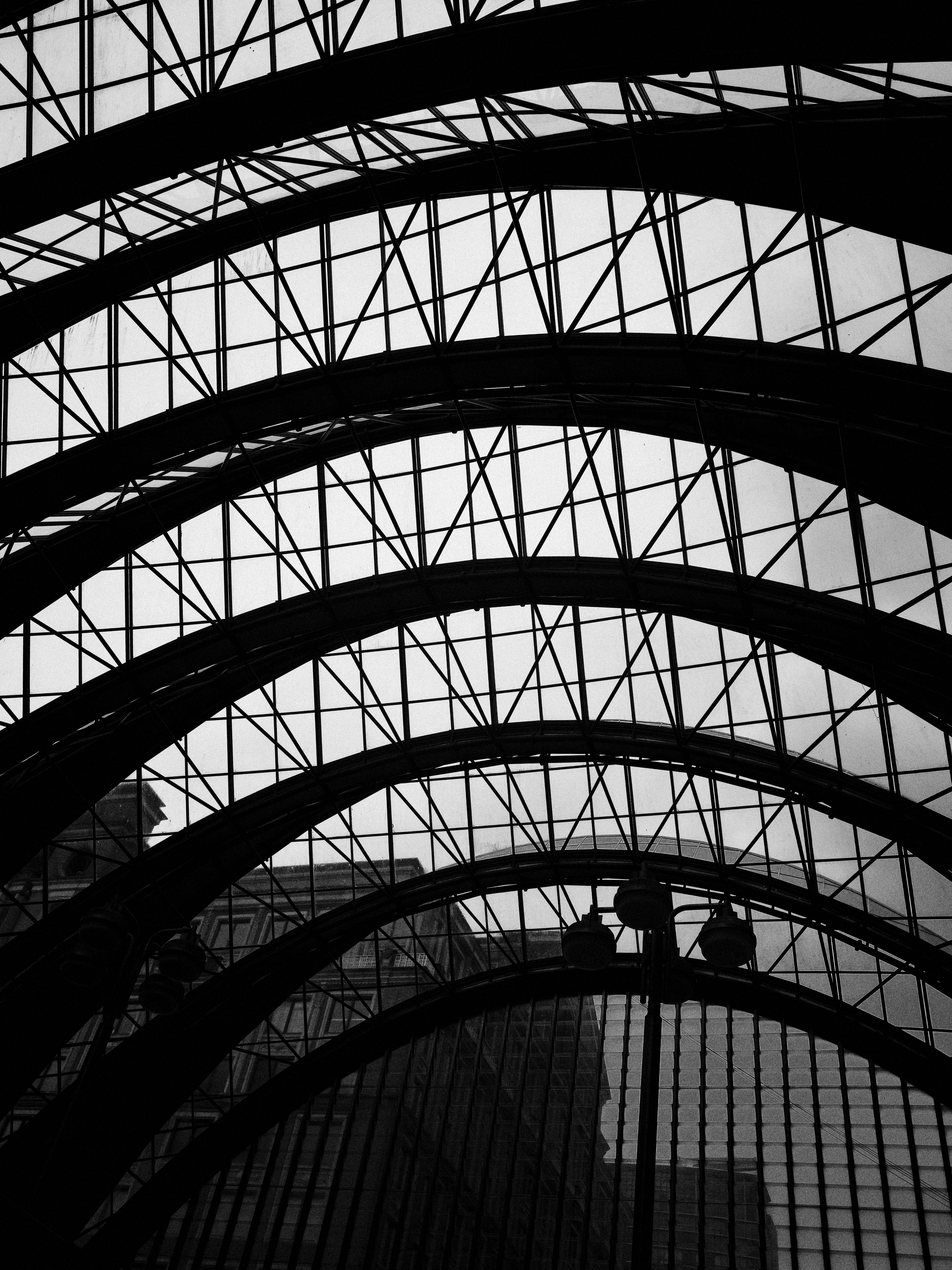a black and white photo of a train station