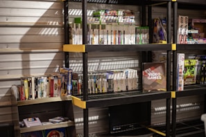 A collection of video game memorabilia on a shelf.