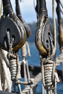 A close-up of hydraulic systems being serviced on a ship.
