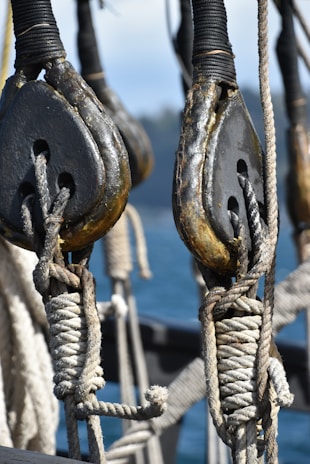 A close-up of hydraulic systems being serviced on a ship.