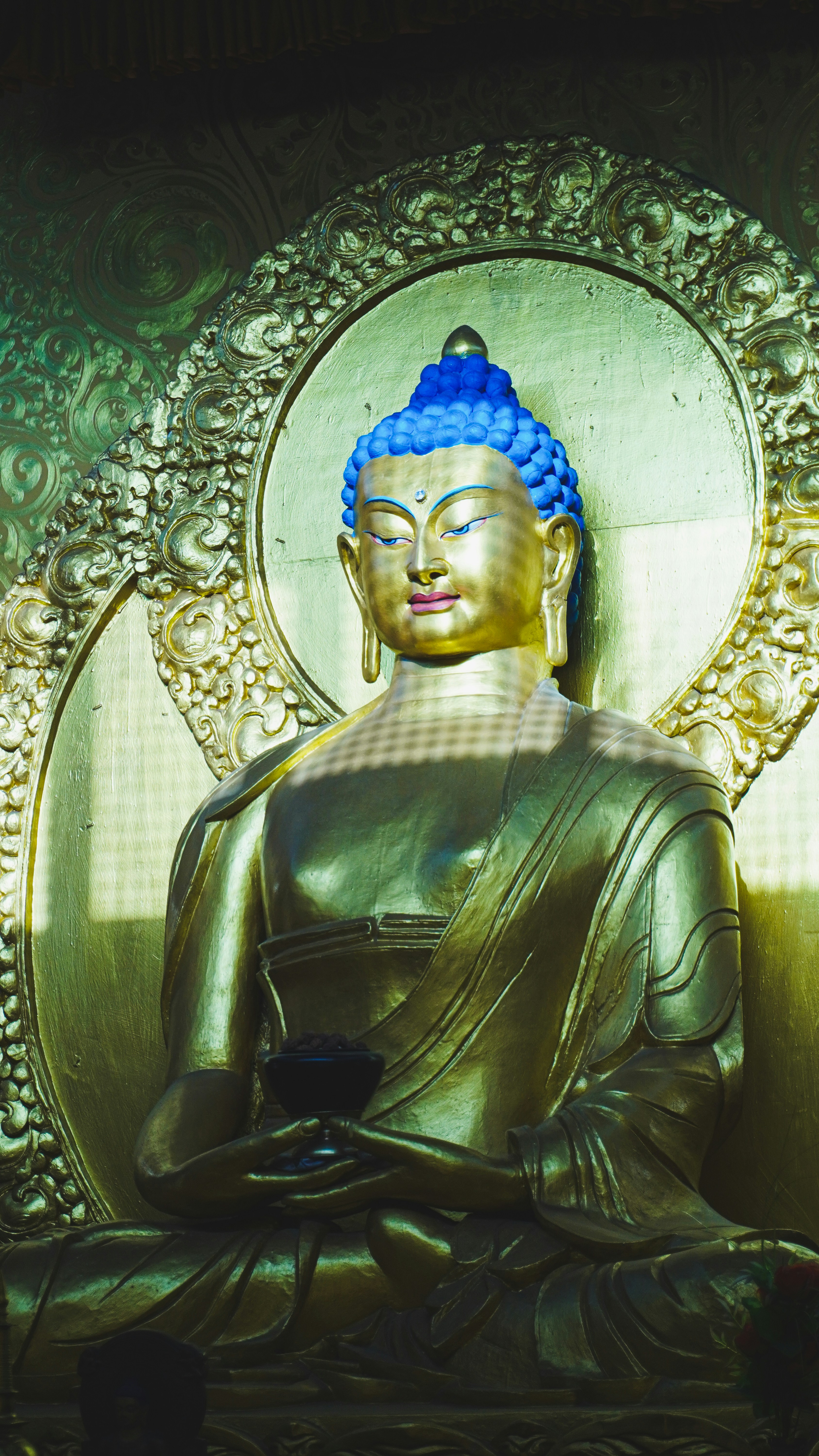 A person meditating in a quiet room.