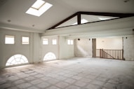 an empty room with a skylight in it