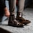 Close-up of a person trying on comfortable shoes indoors.