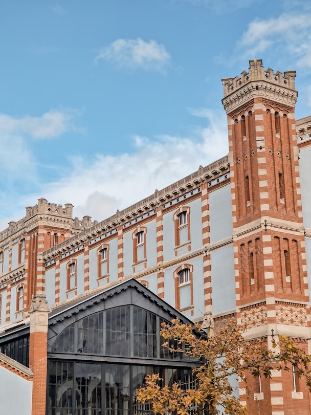 a large building with a clock on the front of it