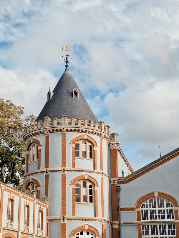 a large building with a clock on the top of it