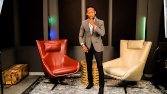 A professional acoustic consultant discussing panel samples with a client in a bright, modern office.