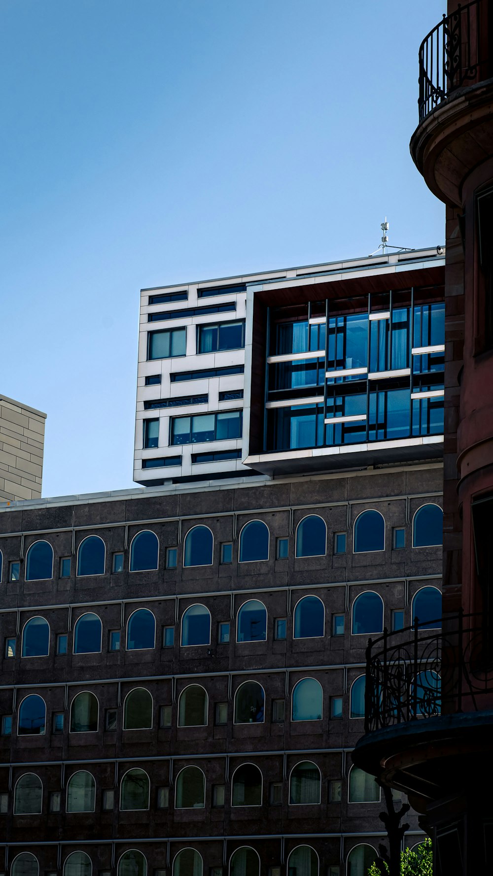 a tall building with a clock on the top of it