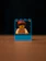 A happy customer unboxing a colorful anime figure from Dalys Toys packaging.