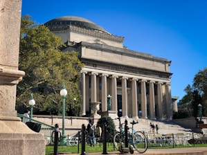 a bike is parked in front of a building