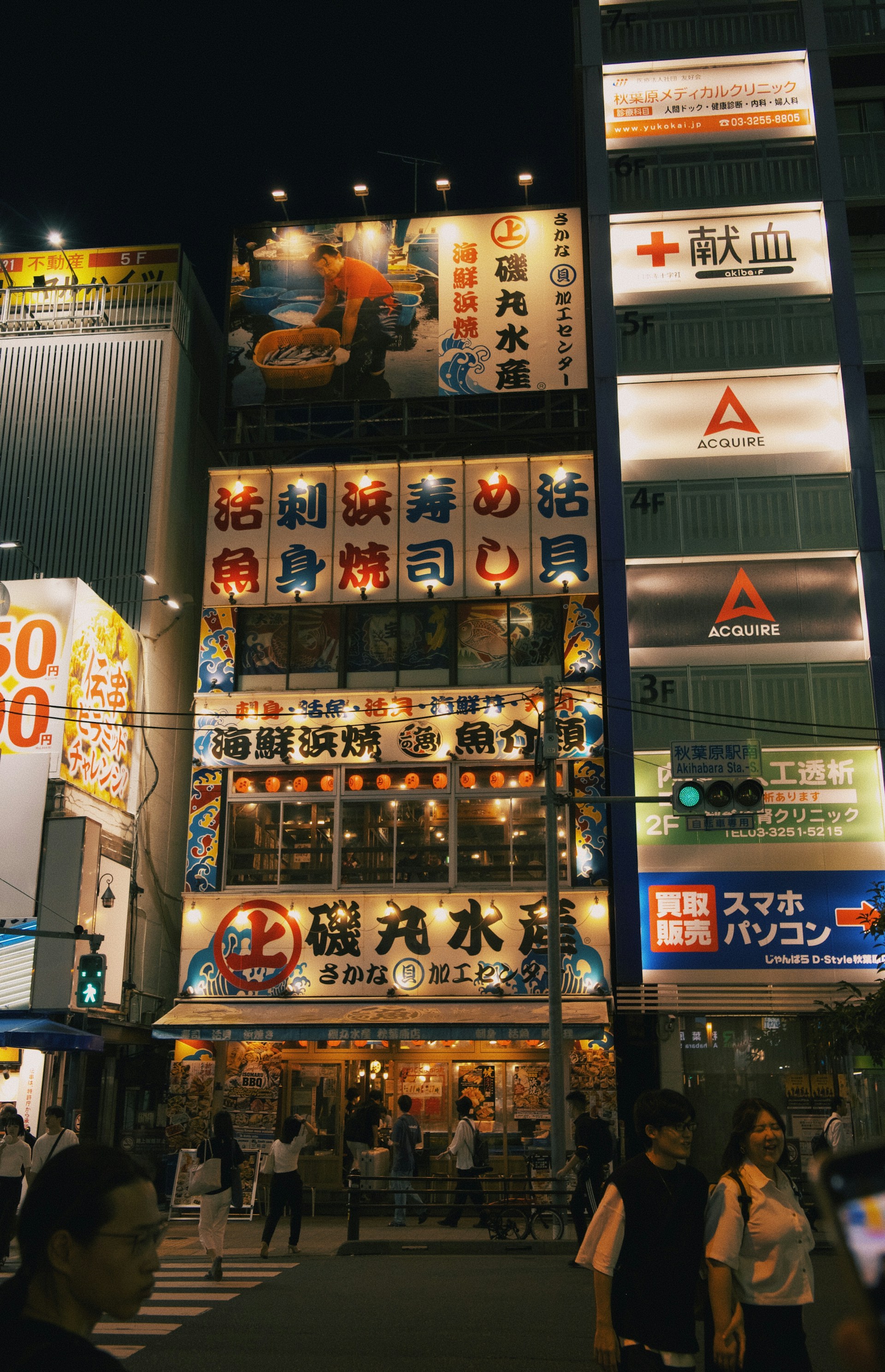 A lively street scene in Tokyo at night, glowing with neon signs and bustling crowds, capturing the city's energetic spirit.