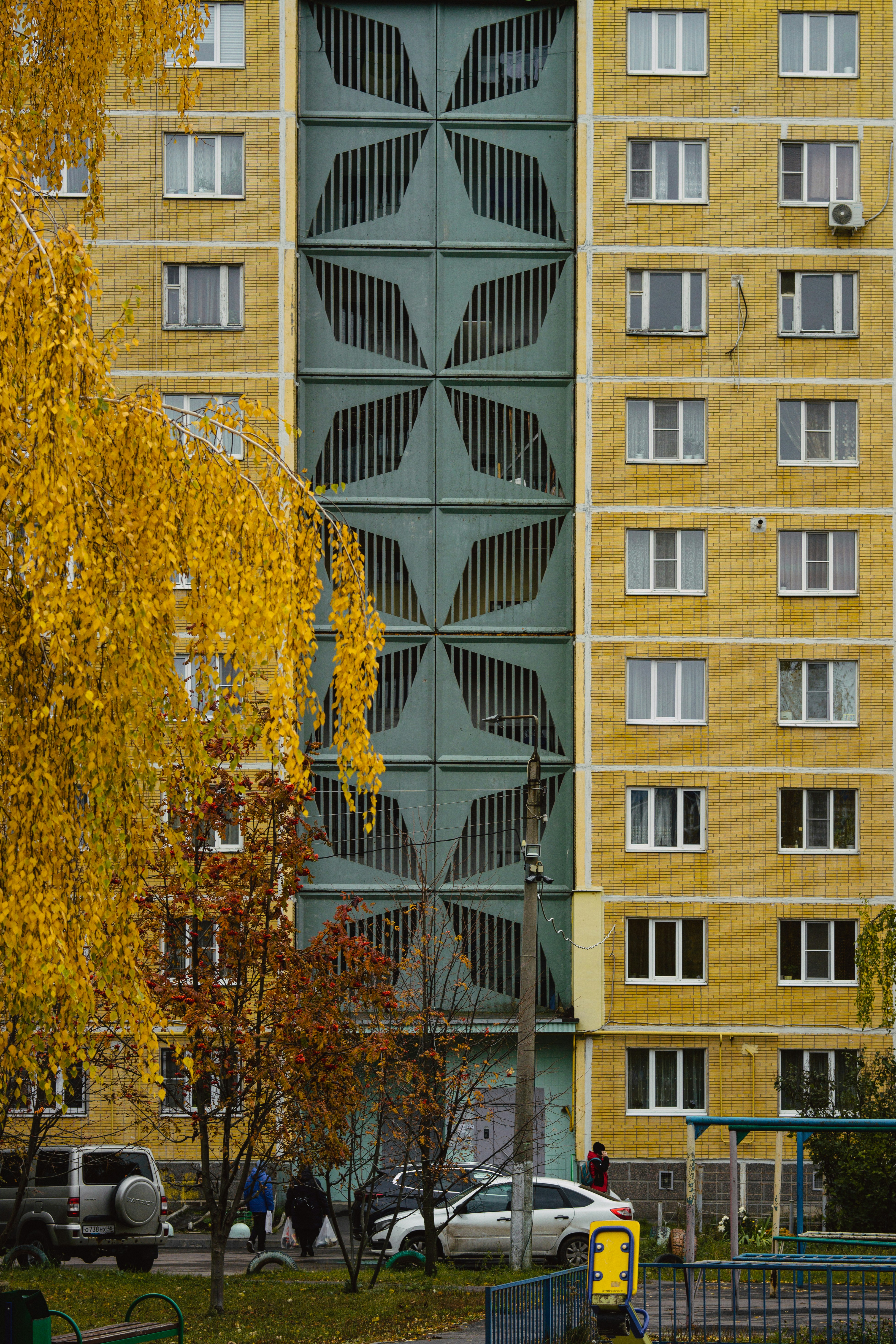a tall building with a clock on the front of it