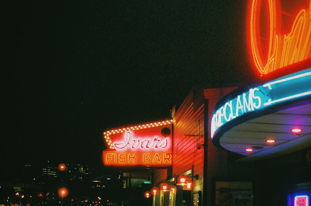 a neon sign on the side of a building