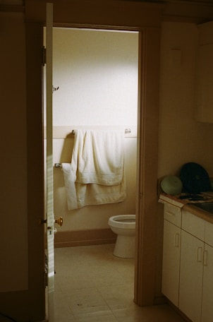 a bathroom with a sink, toilet, and bathtub
