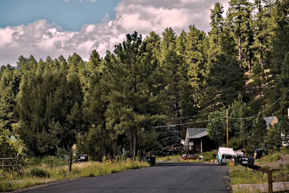 a street with a truck parked on the side of the road