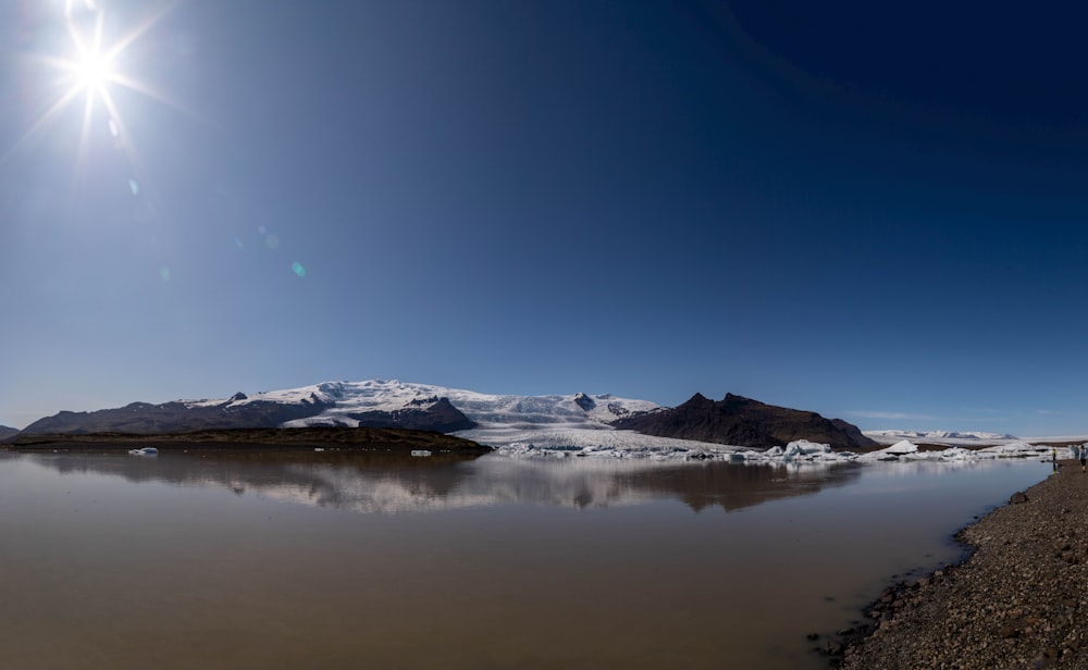 a large body of water surrounded by mountains